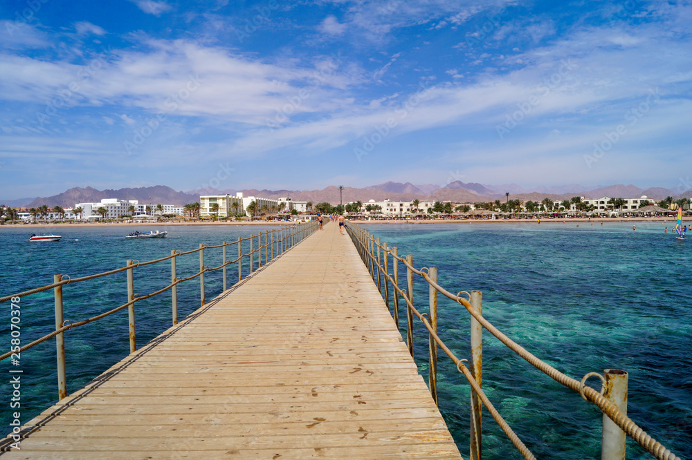 long wooden pier overlooking the beach, Egypt