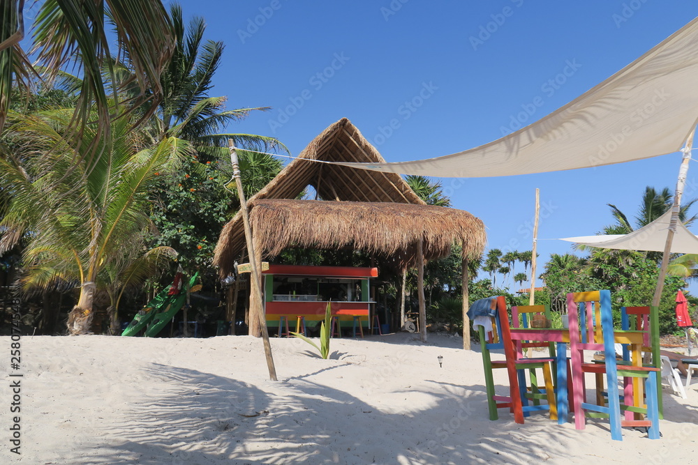 Fototapeta premium beach bar with colorful chairs