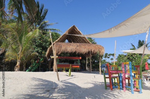 beach bar with colorful chairs
