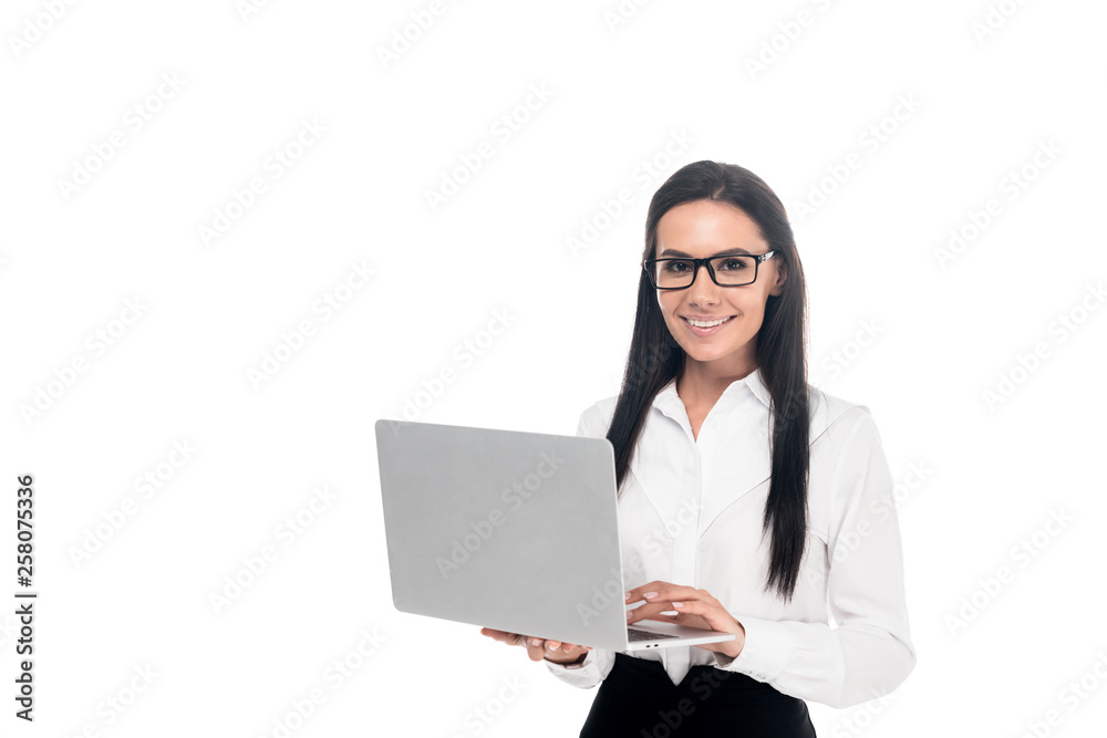 Elegant businesswoman in glasses using laptop isolated on white Elegant businesswoman in glasses using laptop isolated on white