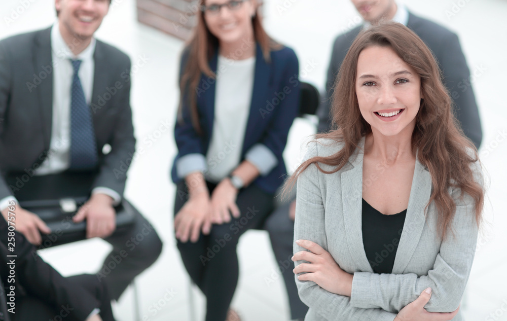 young woman at a business meeting with colleagues. young woman at a business meeting with colleagues.