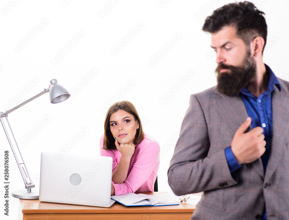 Working together. Manager boss stand in front of girl busy with laptop. Office manager or secretary. Sexy lady office worker. How to contain sexual desire for colleague. Office collective concept Working together. Manager boss stand in front of girl busy with laptop. Office manager or secretary. Sexy lady office worker. How to contain sexual desire for colleague. Office collective concept