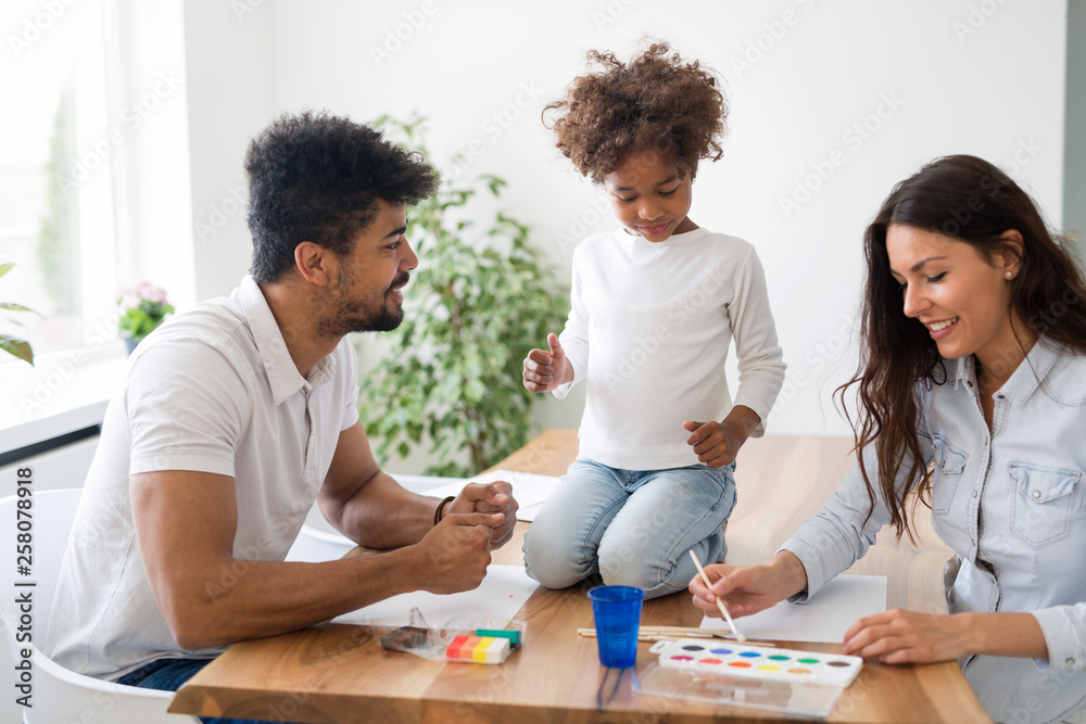 Fototapeta premium Happy familiy spending fun time at home