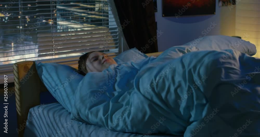 Boy sleeping in his bed Boy sleeping in his bed