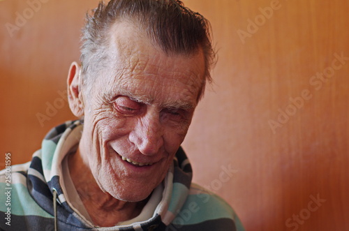 portrait of a blind and deaf elderly man