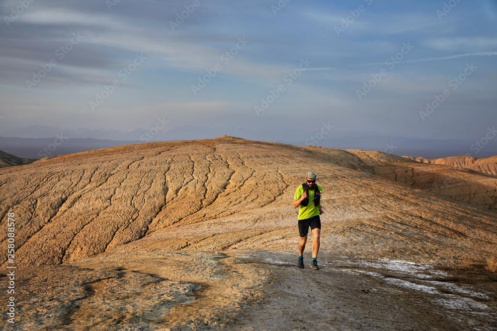 Fototapeta premium Trail running in the desert