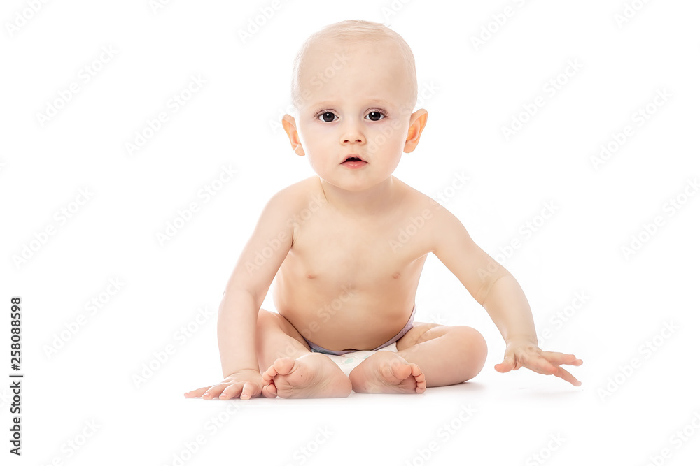 Baby sitting on white background. space for text. Baby sitting on white background. space for text.