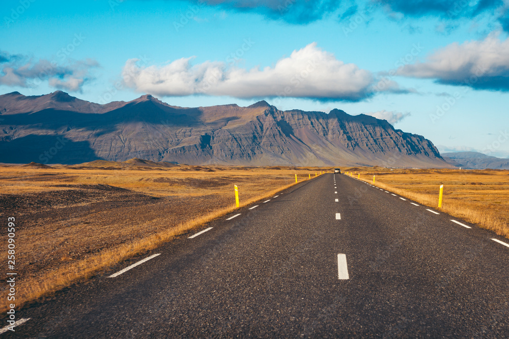 Empty road passing through amazing landscape in Iceland