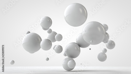 Fototapeta Naklejka Na Ścianę i Meble -  3D illustration of balls of different sizes hanging in space. The idea of order, chaos and harmony. Abstraction. Comparative image of the geometry of space. 3D rendering isolated on white background.