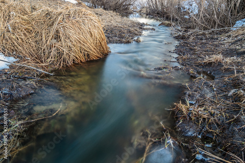Beautiful transparent spring creek