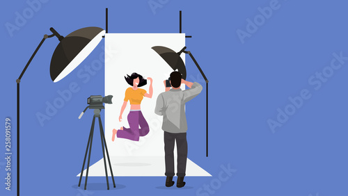 professional man photographer shooting beautiful woman model girl posing fashion shoot modern photo studio interior with lightning equipment horizontal full length