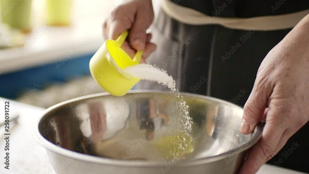 Add sugar to dough in the bowl