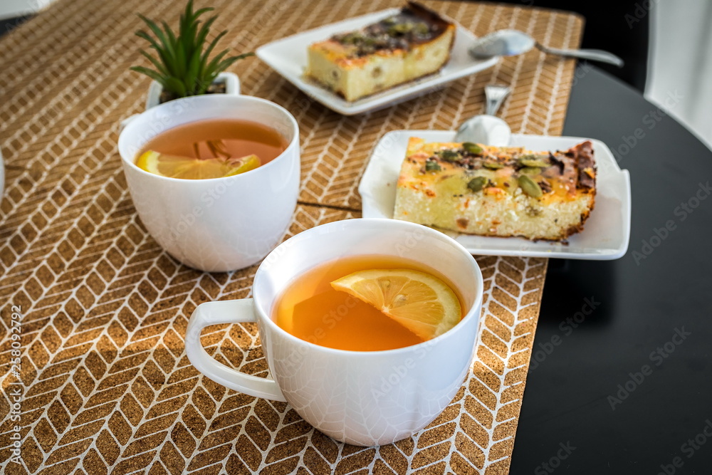 Healthy breakfast tea with lemon and casserole with