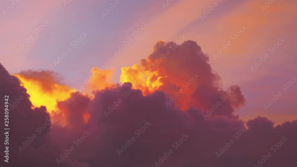 Time lapse video of awesome changing cloudscape at sunset in 4K
