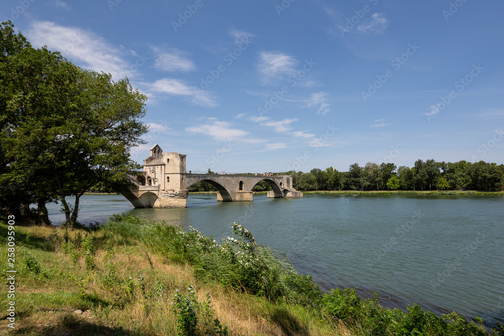 Saint Benezet bridge in Avignon in a beautiful Provence summer day, France Saint Benezet bridge in Avignon in a beautiful Provence summer day, France