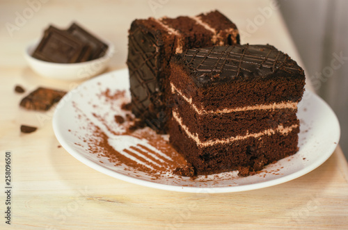 Still life on the table. Sweet cake and a hot drink . chocolate cake .