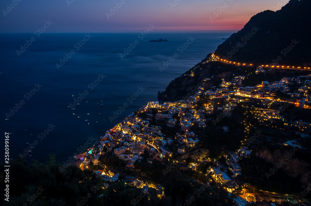 Panorama of beautiful coastal town - Positano by Amalfi Coast in Italy during sunset, Positano, Italy