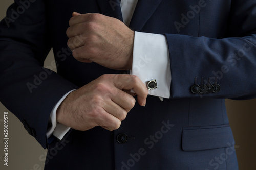 the businessman wear suit with cuff link for job concept.