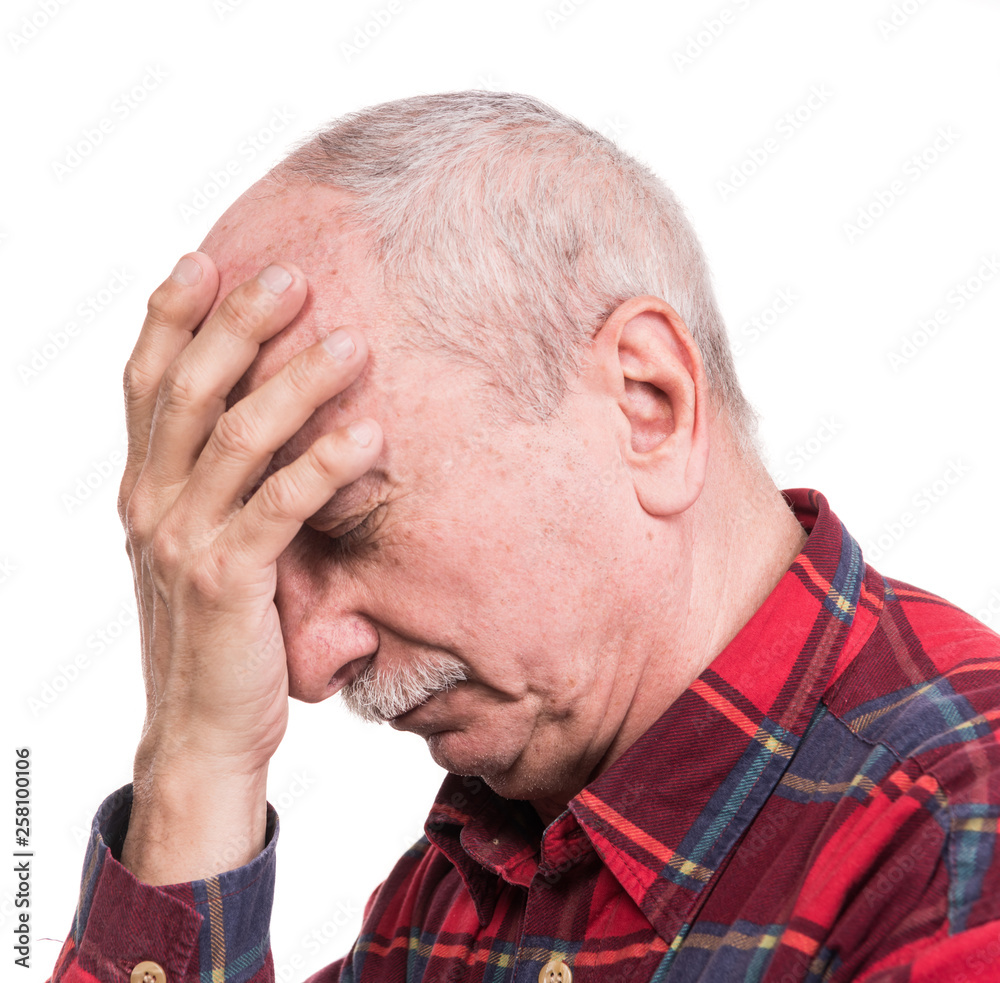 Healthcare, pain, stress and age concept. Sick old man. Senior man suffering from headach over white background Healthcare, pain, stress and age concept. Sick old man. Senior man suffering from headach over white background