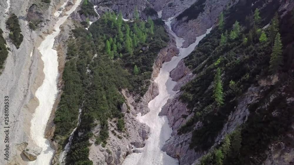 Aerial view of the mudflow with snow high in the Alpine mountains Aerial view of the mudflow with snow high in the Alpine mountains