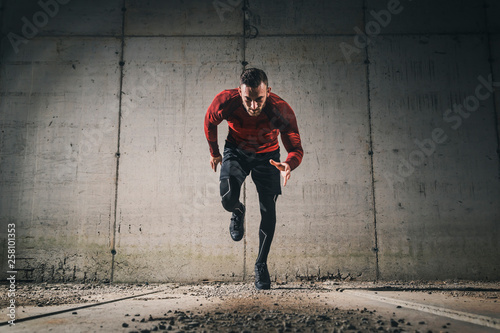 Athletic man sprinting