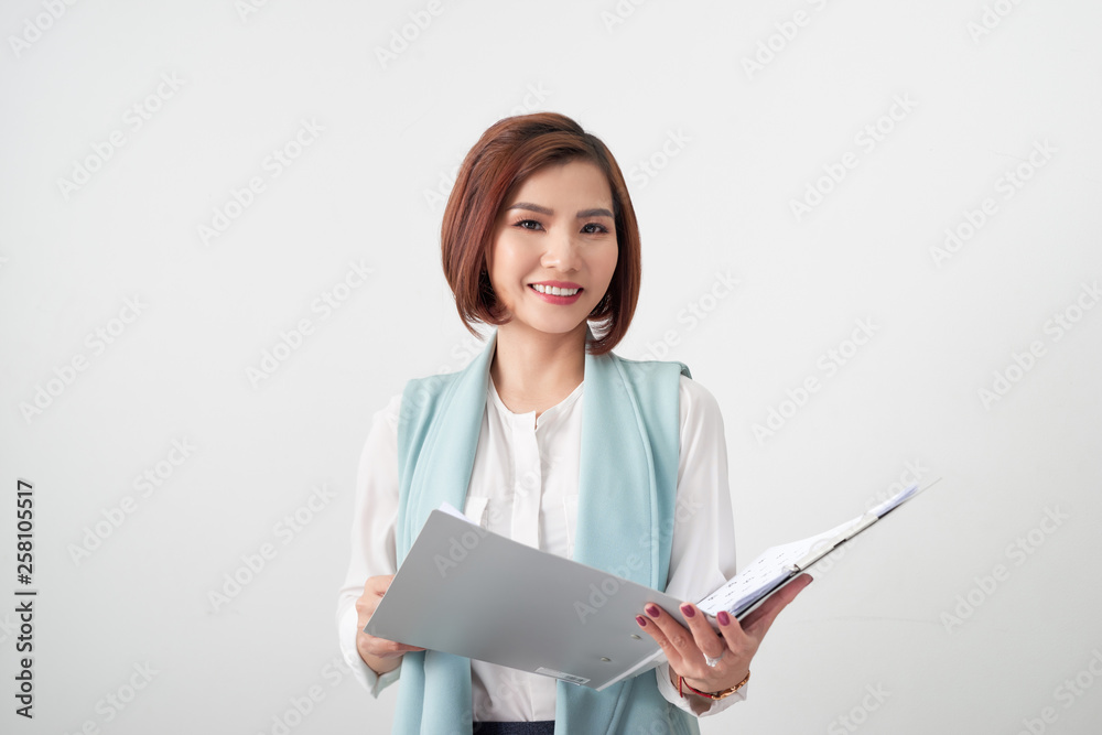 elegant business woman with clipboard on light office background elegant business woman with clipboard on light office background