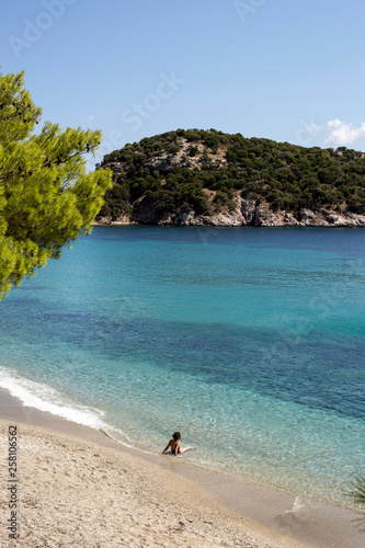 View of the sandy beach, the mountains and the sea (Greece, Skopelos Island)