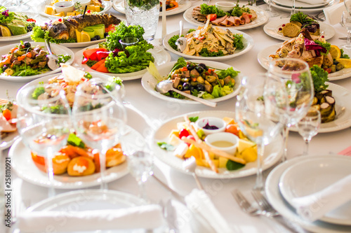 Fototapeta Naklejka Na Ścianę i Meble -  Appetizers and salads on the banquet table