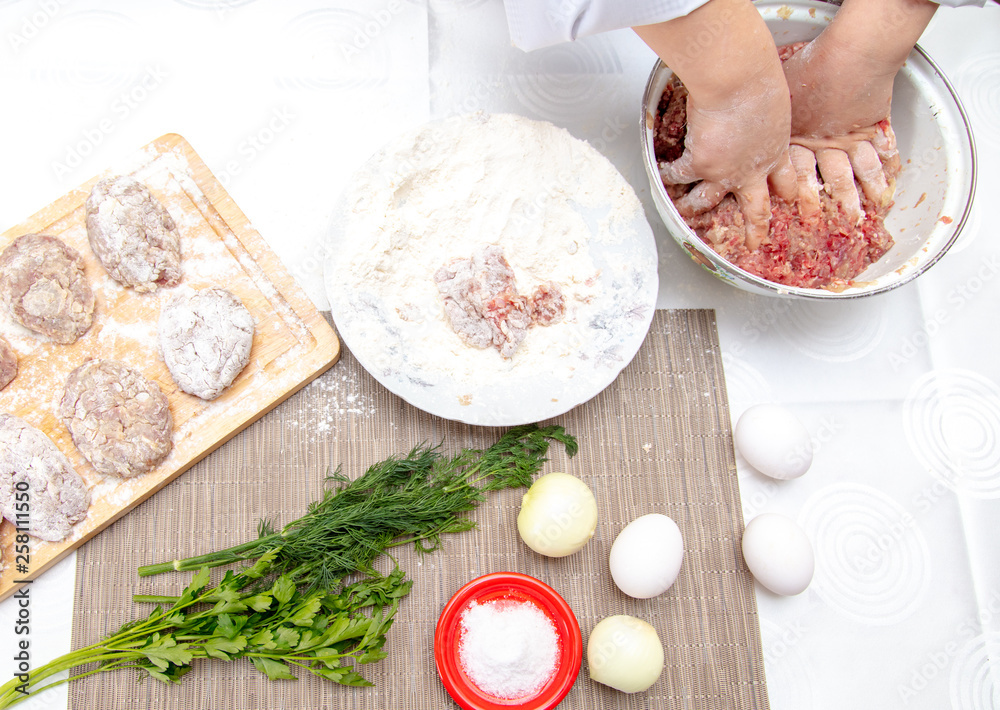 Fototapeta premium Minced meatballs in the kitchen