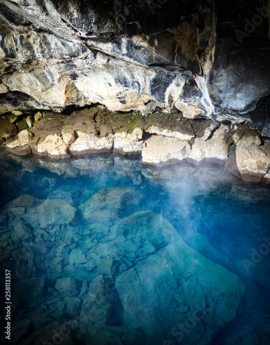 Blue pool in a cave in Iceland