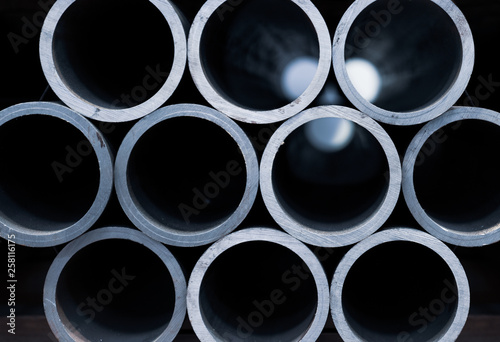 Group of Metal Tubes. Stack of steel tubes