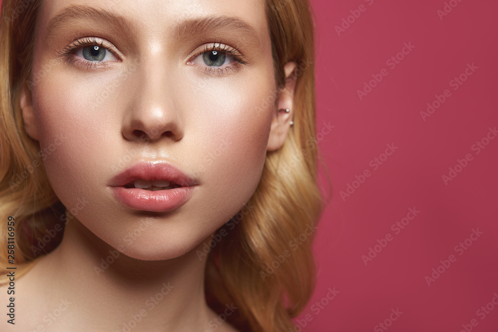 Careful fair haired woman with sensual glance Careful fair haired woman with sensual glance