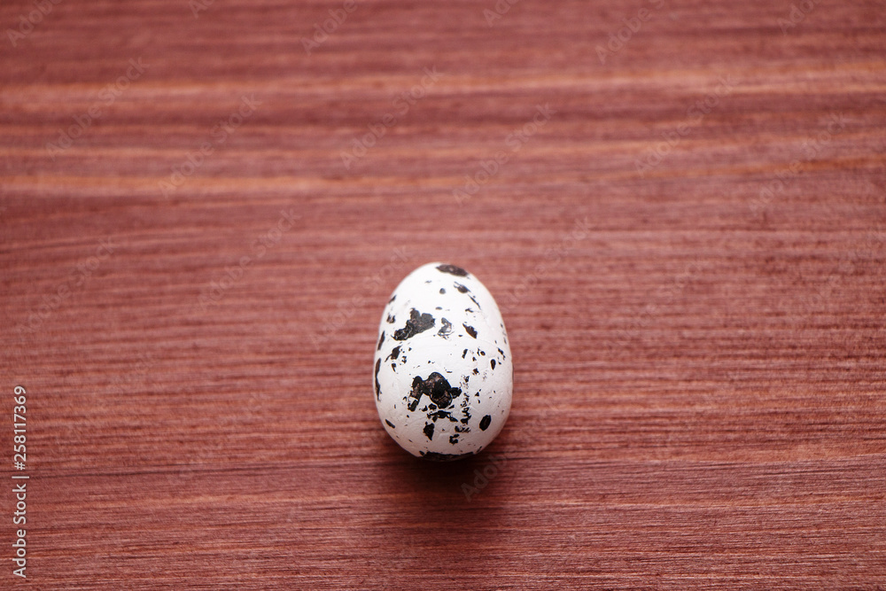 quail egg on a wooden table