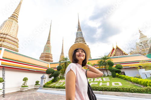Asian tourist women travel in buddhist temple