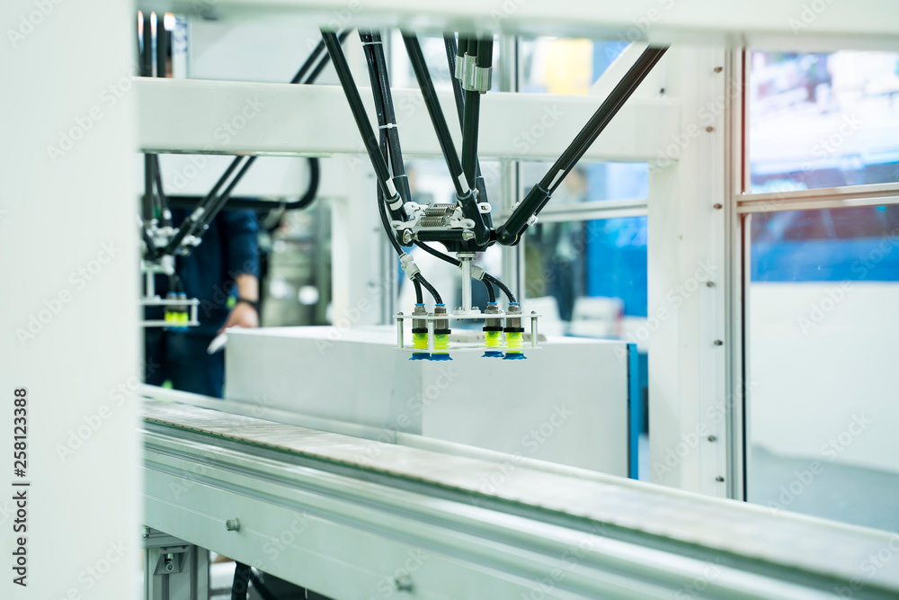 robot with vacuum suckers with conveyor in manufacture factory,Smart factory industry 4.0 concept robot with vacuum suckers with conveyor in manufacture factory,Smart factory industry 4.0 concept