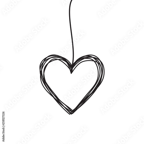 Tangled scribbled heart hanging on a string