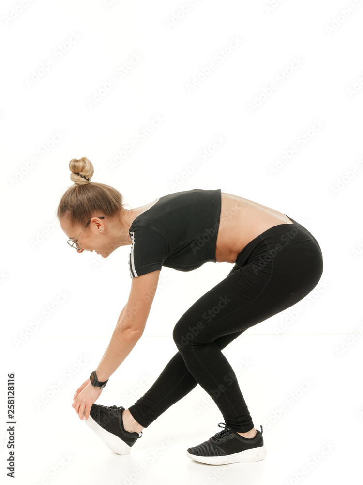 girl doing fitness on a white background.