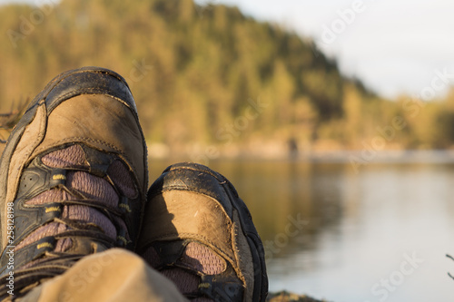 Hiking shoes close up with blurry outdoor background