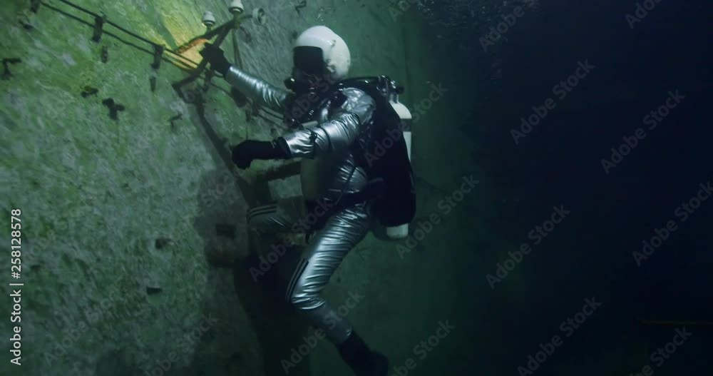 Diver exploring the Kobanya underwater mines, Budapest, Hungary Diver exploring the Kobanya underwater mines, Budapest, Hungary