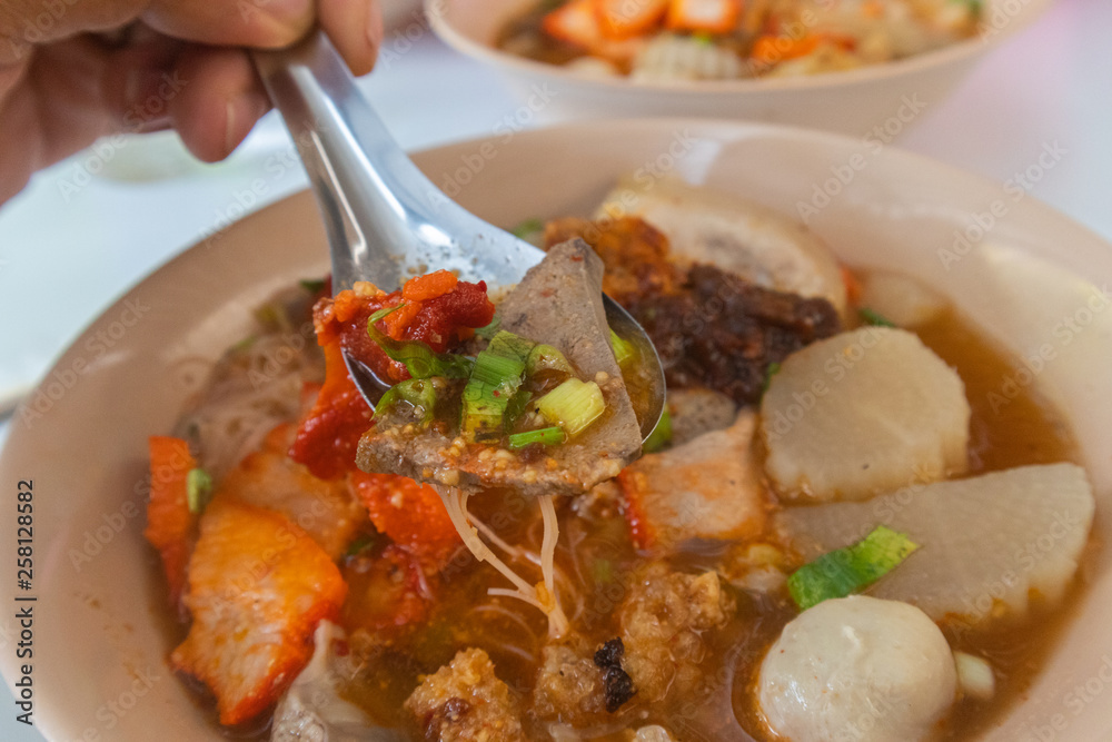 spicy tom yum noodle with pork and meat ball at thailand spicy tom yum noodle with pork and meat ball at thailand
