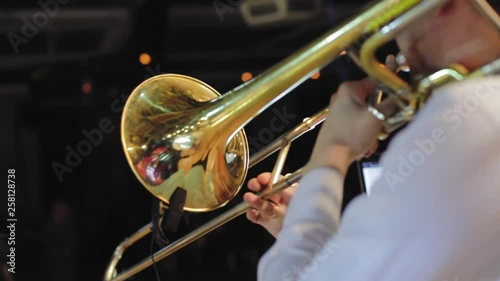 Brass Band live Concert. Portrait of a man playing the trumpet photo