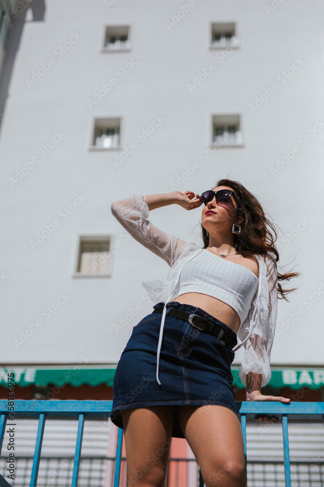 Obraz premium Young and attractive model with summer clothes