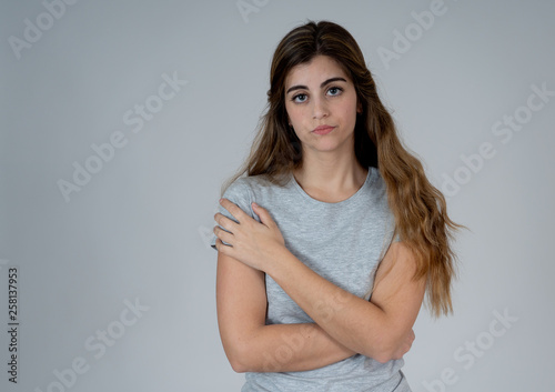 Portrait of sad and depressed woman. Isolated in white background. Human expressions and emotions