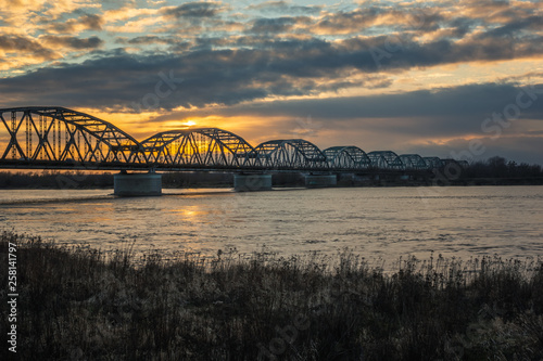 Sunset over the bridge over the Vistula river in Grudziadz, Kujawsko-Pomorskie, Poland