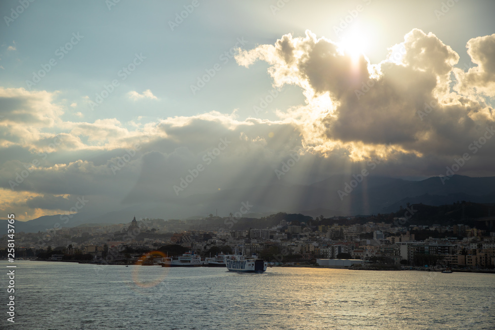 Beautiful view of cityscape and harbor of Messina from ferry, Sicily, Italy