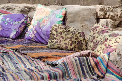 colored carpets and pillows in a Bedouin village in Egypt Dahab South Sinai