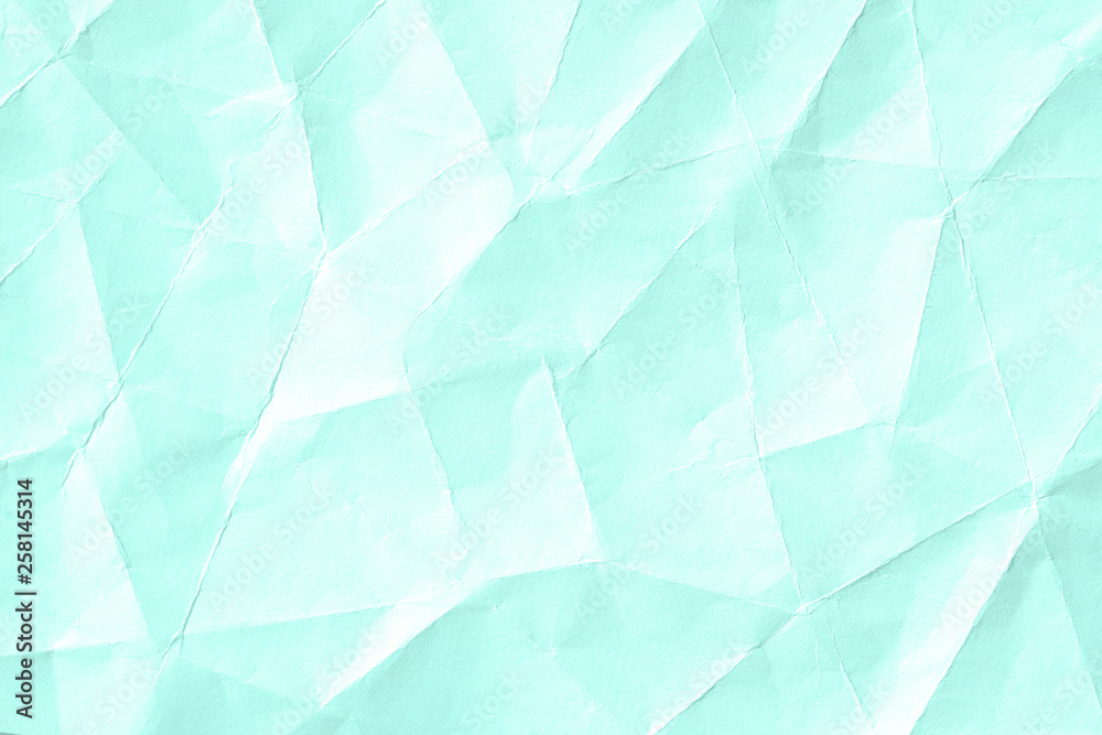 The background is blue. Texture of paper with kinks and dents, old and dilapidated.