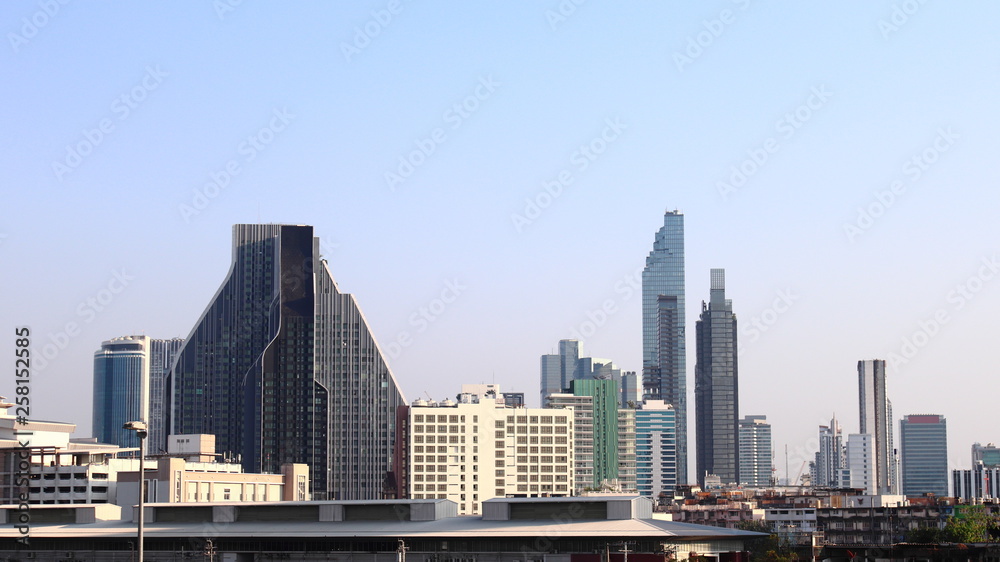 Building with blue sky background cityscape Bangkok, Thailand. 