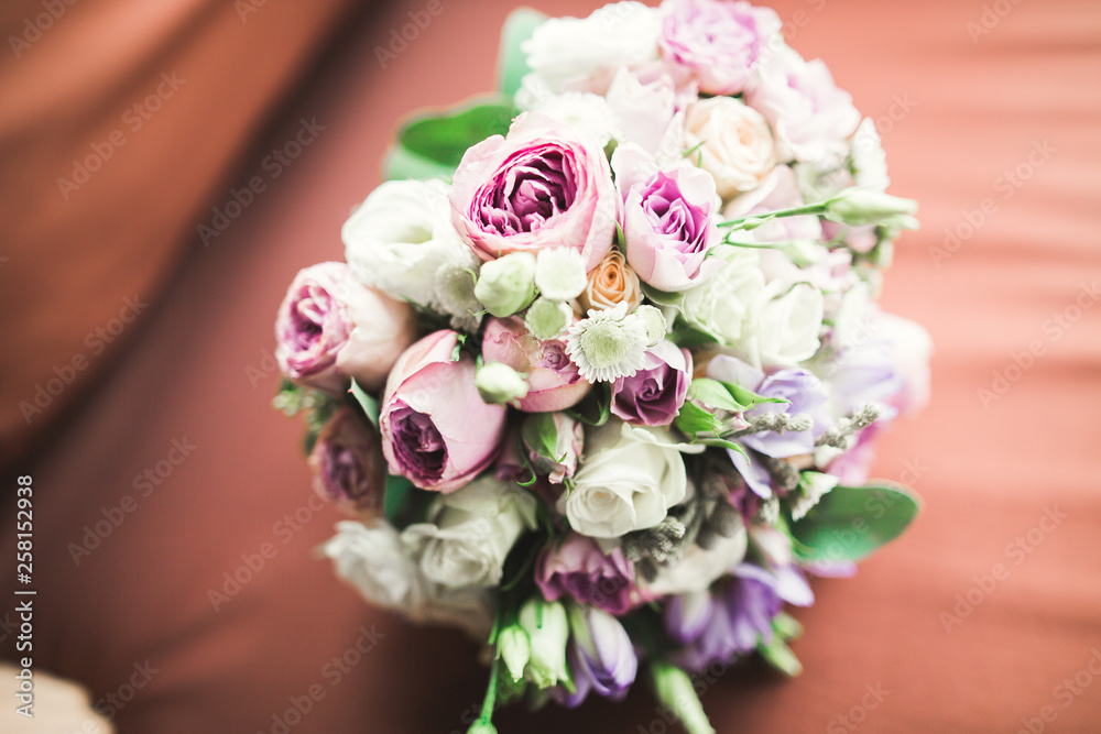 Beautiful wedding bouquet with different flowers, roses Beautiful wedding bouquet with different flowers, roses
