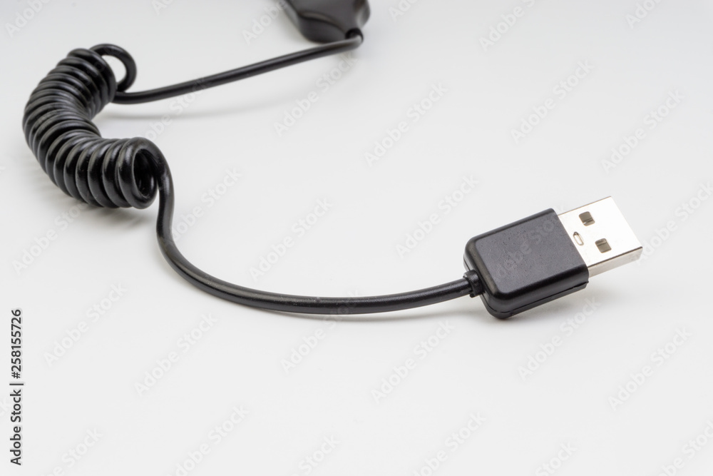 Universal recharger head isolated on white background. Selective focus and crop fragment Universal recharger head isolated on white background. Selective focus and crop fragment